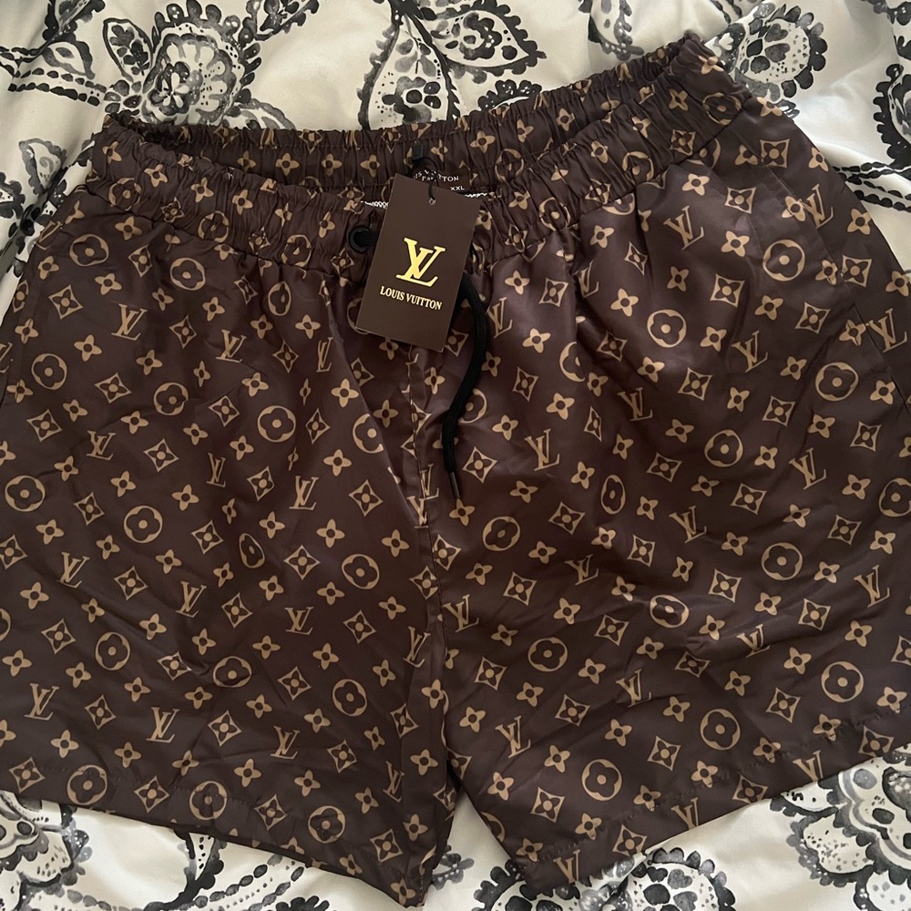 Louis Vuitton Paris swim shorts.